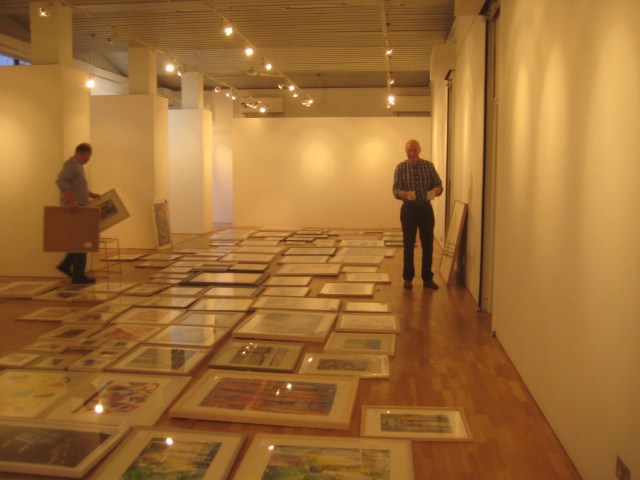 Laying out the paintings